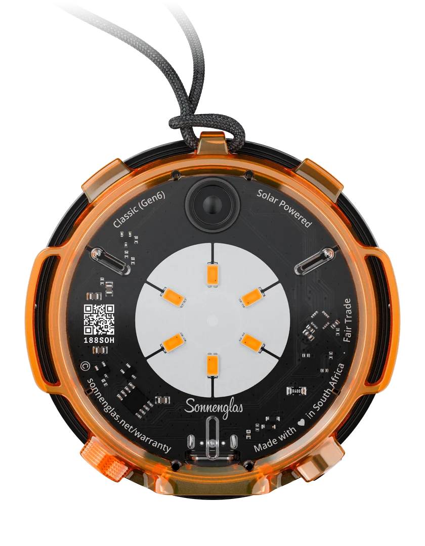 SOMO in the orange Adventure Mount with its hand-knotted carrying strap
